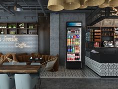 the interior of a coffee shop with an ice cream vending machine and seating area