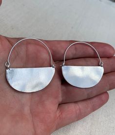 "These are stunning and fabulous boho hoop earrings! They are simple in design while also being effortlessly stylish. The earrings are timeless and versatile. Perfect for everyday wear. The earrings measure 1 3/4\" long by 1 1/2\" wide. Made from allergy free plated silver. Thanks for stopping by! Please take a moment and visit the rest of my Etsy shop. I have many more unique jewelry designs to choose from! 🌸 Tiger Flower Jewelry 🌸 🌸 Inspired by Nature 🌸" Minimalist Handmade Hoop Earrings, Minimalist Metal Hoop Earrings For Everyday, Handmade Minimalist Small Hoop Earrings, Minimalist Crescent Hoop Earrings For Everyday, Minimalist Small Hoop Metal Earrings, Minimalist Small Hoop Earrings In Metal, Minimalist Small Hoop Clip-on Earrings, Minimalist Small Metal Hoop Earrings, Minimalist Semi-circle Hoop Earrings As Gift