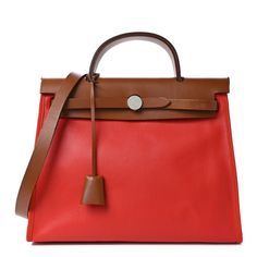 This is an authentic HERMES Toile H Berline Vache Hunter Herbag Zip 31 PM in Naturel and Rouge H. This stylish tote is crafted of sturdy toile canvas in brown and red. It features a rear exterior zip pocket, a brown leather top crest with a leather top handle, shoulder strap and strap closure with palladium hardware. This bag opens to a toile canvas interior with a matching removable pouch. Classic Red Satchel With Leather Handles, Red Travel Bags With Leather Trim, Classic Red Bags With Leather Trim, Red Bags With Leather Trim For Travel, Red Rectangular Shoulder Bag With Leather Trim, Designer Red Bags With Leather Trim, Elegant Red Bags With Leather Trim, Luxury Canvas Bags With Leather Lining, Luxury Red Shoulder Bag With Leather Trim