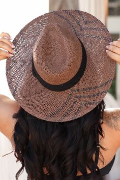 This unique hat adds some chic vibes to your typical beach wear! The fun black details make it easy to transition this one off the beach and into any casual look. Brown, straw, women's wide brim sun hat featuring unique weaved design with black detailing and thick black strap detail. 90% Paper, 10% Polyester. Brim - 4", Inner circumference - 22.5". Shop all colors here. **Final sale item. Black Paper Straw Hats For Summer, Black Paper Straw Hat For Spring, Adjustable Black Straw Hat Made Of Paper Straw, Black Wide Brim Sun Hat For Sunbathing, Lightweight Black Straw Hat, Black Paper Straw Hat With Curved Brim, Casual Black Paper Straw Hat, Black Paper Straw Summer Hat, Spring Black Paper Straw Sun Hat