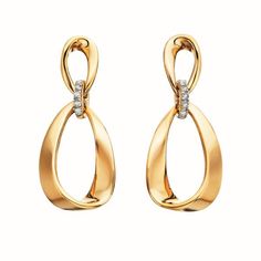 These women's earrings feature yellow gold plated oval links with a diamond connector. The earrings are perfect for adding a touch of elegance to any outfit. Elegant Luxury Oval Pendant Earrings, Luxury Oval Faceted Earrings, Luxury Gold Oval Earrings, Luxury Gold Oval Diamond Earrings, Oval Diamond Earrings With Elegant Design For Formal Occasions, Elegant Oval Diamond Earrings For Formal Occasions, Modern Gold Teardrop Diamond Earrings, Gold Oval Diamond Earrings For Evening, Oval Diamond Earrings With Accents For Evening