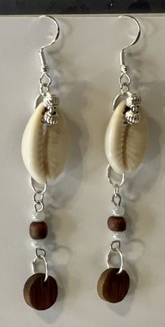 Shell Wood - E-monaejewels LLC Spiritual Sterling Silver Hoop Earrings, Everyday White Sterling Silver Earrings, Single Dangle Earring For Beach, Spiritual White Nickel-free Jewelry, Spiritual Nickel-free White Jewelry, Nickel-free White Spiritual Jewelry, White Bohemian Pierced Earrings, White Bohemian Pierced Jewelry, Unique Sterling Silver Cartilage Earrings With Ear Wire