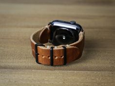 Apple Watch Band 44mm 42mm 40mm 38mm Apple Watch 1-5 / Hecho a | Etsy Vintage Leather Bracelet Strap For Apple Watch, Vintage Watch Bands With Waxed Finish, Vintage Waxed Finish Watch Bands As Gift, Leather Apple Watch Band Perfect As A Gift, Brown Waxed Apple Watch Band For Everyday, Brown Waxed Finish Apple Watch Band For Everyday Use, Handmade Brown Leather Apple Watch Band, Handmade Brown Apple Watch Band, Handmade Adjustable Leather Watch Band