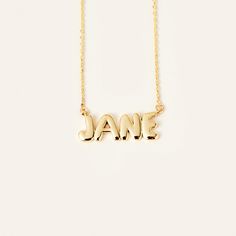 Bubble Letter Name 14K Gold Necklace The Bubble Letter Name Necklace in 14K Gold is a stylish and personalized jewelry. This custom necklace showcases your name in eye-catching bubble letters, beautifully crafted in 14k solid gold, creating a trendy and bold look. With its modern and chic design, it adds a touch of individuality and charm to any outfit. Whether it's a fashion statement or a thoughtful gift, it's a unique and fashionable addition to any jewelry collection. You'll have: 14k solid Letter Name Necklace, Bubble Letter, Gold Bubbles, Necklace Name, Bubble Letters, Jewelry Accessories Ideas, Letter Design, 14k Gold Necklace, Accessories Ideas