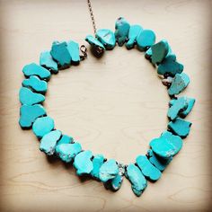 Blue Turquoise Slab stone necklace is a great addition toyour boho wardrobe! Dress up any outfit to add a little western flair.Turquoise in this necklace is a dyed stone and will vary in shades of blue.Stones will vary in size from 1/2" to 1"Measures 18" in length plus a 2" extender Although your item will resemble the photo,each piece is created by hand, so no two are identical. Boho Wardrobe, Tech Jewelry, Boho Turquoise, Leather Store, Color Turquesa, Estilo Boho Chic, Turquoise Boho, Blue Stones, African Turquoise