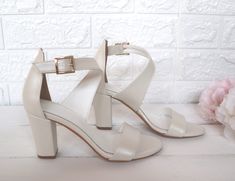 "If you're ever going to treat yourself to a gorgeous pair of shoes, it should be at your wedding. Romantic look - we're completely in love! Block heel wedding white Shoes, these bridals shoes are ideal for your wedding or any event. Heel Height: 8 cm/3.15\" (pictured) or 5 cm/1.96\" Full sizes only ** If you are unsure of your size, please contact me so I can assist you. ** If you need to have your product by a specific date, contact me and we can discuss express construction options. I would l 4-inch Heel Open Toe Block Heels For Wedding Guests, Chic Wedding Sandals With Open Heel, Cream Block Heels For Evening With Open Heel, Open Toe Heels For Wedding Guests, Elegant 4-inch Open Toe Block Heels, Summer Cream Heels For Wedding Guests, Cream Open Toe Block Heels With 4-inch Heel, Open Heel Sandals With Heel Strap For Wedding Guest, 4-inch Open Toe Block Heels For Wedding Guests