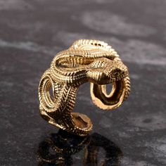 Gothic Skull Ring Snake Ring Unique Skull Rings gift ring gold snake ring SIZE :- All Size Are Available, choose from variation. METAL :- Brass ❥ Customers satisfaction is our biggest priority, please contact us with any questions/queries for future or existing orders, and we will do our best to make sure you are happy with your order. ♥ Please Make Sure to Include The Correct Address During Before Order. You Can return Item within 30 Days After Successful Delivery. We Offer 100% Money Back Guarantee If You Not Satisfied With Your Purchase. Return Charge Will Be Paid By Buyer Only. This is my shop link https://www.etsy.com/in-en/shop/AustereGifts?ref=seller-platform-mcnav Thank you🥰 for shopping with us! Serpent Ring, Skull Rings, Gothic Skull, Snake Jewelry, Dragon Jewelry, Animal Rings, Snake Ring, Gold Snake, Skull Ring