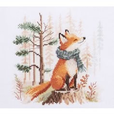 a cross stitch picture of a fox in the woods