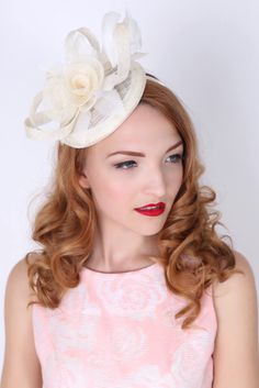 "\"Emelia Rose\" Black Fascinator This vintage-inspired fascinator is as timeless as a fairytale. Let your personality add life to its floral center and ribbon loop accents. It's round base and slip-on headband will allow you to look flawless and enjoy any event with ease! - Easy wear headband - Round sinamay base" Vintage Headband For Kentucky Derby, Cream Mini Hats For Vintage Events, Elegant Cream Costume Hats For Vintage Events, Elegant Cream Fascinator For Vintage Events, Fitted Beige Fascinator For Vintage Events, Vintage Cream Fascinator For Wedding, Vintage Cream Fascinator, Vintage Cream Fascinator For Evening, Adjustable Headpieces For Kentucky Derby And Vintage Events