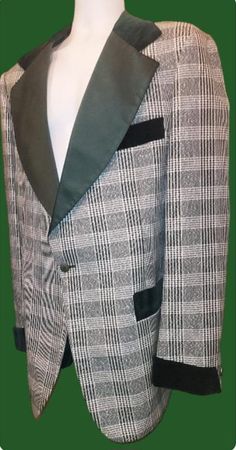 - For your consideration a very cool vintage 60s / 70s era plaid tuxedo jacket / sport coat with velvet  / velour trim on cuffs and pockets and satin style lapels by After Six . Made in the USA  !  - Color = the color is a dark green and white with a metallic silver thread.  - Size = 48 long . Please compare measurements.  - Measurements = length neck to hem = 34" , pit to pit laying flat across = 23" , shoulder to shoulder = 20" , and shoulder to cuff = 27". - Condition = great vintage condition with minimal if any wear.  Awesome jacket ! Plaid Tuxedo, Jacket Sport, Satin Style, After Six, 70s Era, Mens Sport Coat, Tuxedo Jacket, Union Made, Vintage 60s