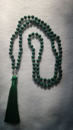 "Amazing handcrafted, quality and highly charged prayer beads for  focus, meditation, protection, and guidance. These beads were traditionally made with the \"rudraksha\" seeds, which are the seeds of an evergreen tree widely spread across India, as well as with sacred basil herbs, woods, or gemstones. Originally, mala beads are made of 108 beads and the largest bead in the center is also known as the \"guru\", which is said to encapsulate the energy created during the practice. There are several reasons as to why Malas are composed of 108 beads:  108 is the number related to the utmost important mantra, the \"Om\" The average distance of the moon from the Earth is roughly 108 times the diameter of the moon. Traditionally in ancient Indian numerology, one stands for God or higher Truth, ze Handmade Spiritual Mala, 8mm Spiritual Beads For Meditation, 108 Spiritual Beads For Meditation, 108 Spiritual Meditation Beads, Spiritual Gemstone Beads For Rituals, Traditional 8mm Beads Mala For Healing, Spiritual Beaded Mala For Healing, Traditional Mala With Gemstone Beads For Healing, Natural Stone Rosary With Round Beads For Meditation