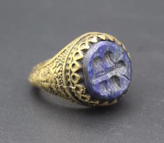 I am offering Vintage Afghan traditional alpaka handmade ring. Its %100 Hand Crafted workmanship with beautiful glass Lapis Lazuli stones and unique Bee carved with lovely designs. Please do not hesitate to contact if you have any questions.  Ring Size : 10 on US ring mandrel Weight : 10.6 Grams, Please know what you are bidding on. The metal of Most Kuchi, Afghan and Turkoman items are called with different names, Some called Alpaca silver, German Silver and Tibetan Silver. They do not give any Ring Mandrel, Afghan Jewelry, Vintage Afghan, Lapis Lazuli Stone, German Silver, Boho Ring, Multi Stone Ring, Boho Rings, Belly Dance