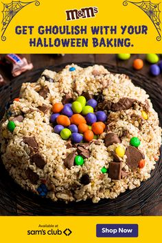 a cake with m & m's on it and the words get ghoulish with your halloween baking