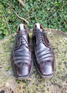 "Nicely broken in with lots of wear left, these classic Wingtips are US made vintage quality. They are a Cordovan leather with stitched leather soles and stacked rubber 1 1/8\" heel. They are marked a size 10-11 D. The ball of foot measures 4 3/8\", 12 1/2\" long heel to toe measurement. Imperial Super brand. Sustainable dress shoes.. Classy and comfortable. Length: 12.5\" Width:4\" Heel: 1.5\" Color: Burgundy Condition: Good Vintage Brand: Imperial Super Prime" Vintage Moc Toe Dress Shoes For Semi-formal Occasions, Brown Leather Formal Shoes With Vibram Sole, Vintage Wingtip Boots For Formal Occasions, Formal Brown Leather Shoes With Vibram Sole, Vintage Snip Toe Boots For Formal Occasions, Vintage Brogue Boots For Business, Classic Vintage Brown Boots For Formal Occasions, Vintage Wingtip Goodyear Welted Boots, Vintage Goodyear Welted Wingtip Boots