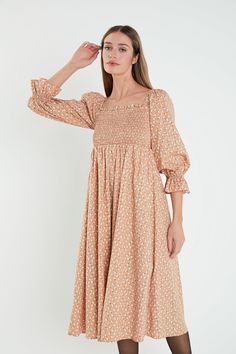 This English Factory dress is a wardrobe staple. With a stylish floral print on a figure-hugging silhouette, this midi dress is perfect for any outing. The smocked bodice is flattering and feminine, while the off-shoulder neckline makes it versatile enough to wear on any occasion. Smocked bodice The elastic neckline can be worn on or off-shoulder Midi length Floral print Hand wash cold Do not bleach Do not tumble dry Iron low Shell: 70% Cotton 27% Nylon 3% Spandex Lining: 100% Rayon Exclusive of Embroidery Sweater, Hugging Silhouette, English Factory, Floral Print Design, Pattern Sweater, Mini Dress With Sleeves, Formal Occasion, Midi Length, Wardrobe Staples