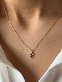 Yummy red strawberry necklace  NEW! Make it custom 🔠 We can engrave an initial or a name to the behind of strawberry pendant Get this beautiful minimalist jewelry made with the quality of perfect elements✨ You can choose 925K Sterling Silver with the options of Gold, Rose Gold or White Gold colors. High quality jewelry for everyone 🤍  Details * 925K Sterling Silver Option → 14K Gold, Rose Gold or White Gold plated * Chain length is approximately 18 inches (16+2 in extender) / 45 cm (40+5 cm extender) * Time is everything! You will receive your package as soon as possible 🚚  * We care about the quality of metal to make sure it will last for a long time * We use enamel technique to color the jewelry and high quality zircons only * There can be tiny differences on each item. Length differe Red Initial Pendant Jewelry As A Gift, Red Initial Pendant Jewelry For Gift, Red Initial Pendant Jewelry Gift, Berry Colored Fruit Design Jewelry Gift, Silver Jewelry With Fruit Design For Gifts, Dainty Red Personalized Necklaces, Red Personalized Dainty Necklace, Dainty Personalized Red Necklaces, Personalized Red Dainty Necklace