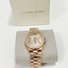 New Michael Kors Lennox Pav Logo Rose Gold-Tone Watch Conditions New In A Box Timeless Pink Gold Watch With Diamond Hour Markers, Michael Kors Gold Watches With Diamond Hour Markers, Gold Michael Kors Watches With Diamond Hour Markers, Designer Rose Gold Watches With Diamond Hour Markers, Formal Rose Gold Diamond Analog Watch, Michael Kors Gold Diamond Watch With Metal Dial, Michael Kors Gold Diamond Watch With Round Dial, Timeless Michael Kors Watch As Gift, Michael Kors Timeless Watch As Gift