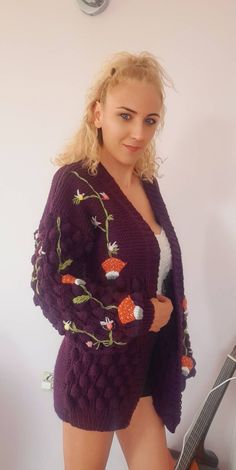 famous plum color mushroom daisy cardigan with quality yarns that you can wear for years It is knitted, the trendy hand knitted mushroom cardigan has been knitted with non-fading threads for many years, plum color country garden cardigan was originally hand knitted by me. You can give it as a gift to your girlfriend, a gift to your wife on your wedding anniversary, or a gift to your mother on mother's day, which will make you feel special. I can knit the main color in the color you want from the Purple Knitted Long Sleeve Outerwear, Embroidered Knit Cardigan For Fall, Winter Floral Embroidered Knit Cardigan, Cozy Embroidered Winter Cardigan, Bohemian Winter Sweater With Floral Embroidery, Cozy Embroidered Fall Cardigan, Winter Hand Knitted Purple Cardigan, Hand Knitted Purple Winter Sweater, Winter Hand Knitted Purple Sweater