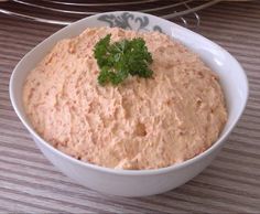 thermomiia pan - receipt is displayed in front of a bowl filled with hummus