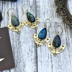 Brass and Labradorite Earrings Dimensions - Approximately 1.89" long This listing is for 1 pair of earring. Pictures are an example of what yours will look like. Each piece is unique and beautiful. Please allow for differences. • Each piece and crystal is unique and beautiful. • All items come ready for gift giving. Follow Foxlark for behind the scenes shots and the newest pieces... www.instagram.com/foxlark www.facebook.com/foxlark -Curated by @foxlark collection - Handcrafted natural stone, cr Auntie Vibes, Bohemian Jewels, Romantic Clothing, Brass Jewellery, Run The Jewels, Jewelry Tips, Bold Jewelry, Labradorite Earrings, Handmade Fashion Jewelry