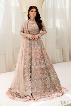 4 Pieces Fully stitched outfit, Perfect for an Engagement, Nikah, or for Walima day and also suitable for light wedding dress.    Luxuriously curated Powder Pink Pure Organza Long Dress with beautifully encrusted neckline combined with intricate hand detailing of pearls, diamantés, sequins and 3D floral work and a scalloped worked border cascading regally over a Tissue Lengha. Powder Pink Tissue Under blouse to fully cover Midriff.  Intricately hand embellished Head border of Net dupatta and rem Walima Dress, Salwar Kamiz