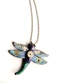 Steampunk necklace for her. Dragonfly necklace - statement jewelry gift. Dragonfly necklace, steampunk jewelry necklace made of watch particles and polymer clay. Please, note that this particular piece isn't available. The watch pieces are unique and never exactly the same, but the whole concept would be as close as possible to the one you see on the photos above or you could ask for a custom order, if you have an idea of your own :-)  The size of the dragonfly would be about 2.5 in x 2.5 in (6. Steampunk Style Round Pendant Necklace Gift, Steampunk Nickel-free Necklace For Gift, Steampunk Pendant Necklace Handmade, Steampunk Handmade Pendant Necklaces, Steampunk Handmade Pendant Necklace, Handmade Steampunk Pendant Necklaces, Handmade Steampunk Style Pendant Jewelry, Vintage Handmade Dragonfly Necklace, Handmade Vintage Dragonfly Necklace