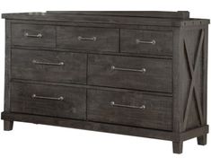 the dresser is made out of wood and has metal handles