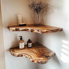 two wooden shelves with soap and lotion on them