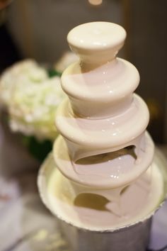 a close up of a white object on a table