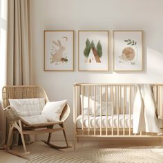 a baby's room with three pictures on the wall and a rocking chair next to it