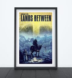 a framed movie poster with the title land's between