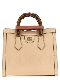 Small leather 'Diana' shopping bag with antique gold metal details, bamboo handles with 2 decorative bands, front metal logo and embossed logo, adjustable and removable fabric shoulder strap, adjustable and removable leather shoulder strap. Composition: Gucci Diana, Stella Mccartney Bag, Guccio Gucci, Jimmy Choo Bag, Bamboo Handles, Valentino Bags, Green Shoes, Metal Logo, Card Holder Leather