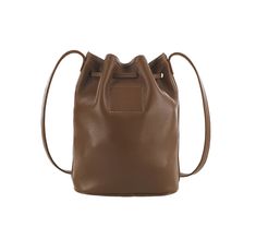 When it comes to a cool carry-all for just the essentials that's perfect on the go, it doesn't get much better than this bucket bag. Gracie features a rich, full-grain, unlined leather body, and leather drawstring strap for long lasting, laid-back style. Comfortable to wear over the shoulder or across the body, keeping your essentials close at hand and easily accessible.
Handcrafted in the U.S.A. (7.00"W, 8.50"H, 3.25"D) Leather Bucket Satchel For On-the-go, Fall Bucket Bag For Daily Use, Classic Brown Bucket Bag For On-the-go, Fall Shopping Bucket Bag, Fall Travel Bucket Bag, Fall Leather Bucket Bag, Brown Bucket Bag For Fall, Trendy Brown Bucket Bag For Travel, Leather Bucket Bag For Fall