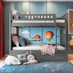 a child's bedroom with bunk beds and stuffed animals on the rug in front of it