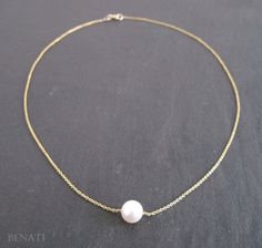 "New from Benati! A extremely elegant freshwater round pearl necklace, floating gracefully on a beautiful solid 14k gold link chain. Crafted to perfection in 14k solid gold. The pearl is hanged on a elegant, delicate and durable, gold links chain (As seen in pictures), approx. width: 1.0 mm (0.039\") chain. You or your friend will look super fine with this new exclusive design - by Benati. The size of the round pearl is approx.: 8 mm round - 0.31\" a very beautiful and high quality freshwater pe Gold Pearl Necklace With Cable Chain, Formal Pearl Necklace With Cable Chain, Formal Pearl Necklace With Gold Chain, Formal Yellow Gold Chain Necklace With Pearl Charm, Formal White Pearl Necklace With Cable Chain, Delicate Gold Pearl Necklace With Cable Chain, Elegant Pearl Necklace With Cable Chain, Elegant Gold Pearl Necklace With Cable Chain, Elegant White Pearl Necklace With Cable Chain