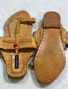 Men Sandals - Natural Brown Leather Kolhapuri Chappals, Jesus Shoes for Men, Buffalo shoes, Men Flats, Ethnic Indian Slip OnsIf you don't find your size you can check this design for available sizeshttps://www.etsy.com/in-en/listing/1015217153/men-slip-ons-mens-kolhapuri-chappals-manUpper Material: Leather strapSole Material - Vegetable tanned leather soleSole Thickness- The thickness of the sole is 4-6 mm.Interesting Facts about kolhapuri chappals- Not a single iron nail is used in the entire m Traditional Closed Toe Toe Ring Sandals For Festivals, Brown Leather Footbed Toe Ring Sandals, Traditional Leather Sole Festival Sandals, Traditional Festival Sandals With Leather Sole, Traditional Toe Ring Sandals For Festivals, Traditional Slip-on Sandals For Festivals, Traditional Open Toe Sandals For Festivals, Festival Sandals With Leather Sole And Single Toe Strap, Traditional Closed Toe Huarache Sandals For Festivals