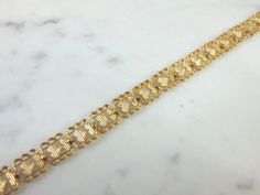 "FOR SALE IS A VINTAGE ESTATE 10K YELLOW GOLD HEART FILIGREE BRACELET. THE BRACELET MEASURES 7 5/8\" LONG FROM THE CLASP BY 1/4\" WIDE, AND WEIGHS 6.8g. CONDITION IS VERY GOOD. THIS WOULD MAKE A LOVELY GIFT AND IS A GREAT VALUE FOR THE MONEY. IF ANY OTHER QUESTIONS, PLEASE ASK. BE SURE TO CHECK OUT SOME OF MY OTHER GREAT ITEMS UP FOR SALE. THANK YOU" Formal Yellow Gold Bracelet With Decorative Band, Gold Bracelet With Decorative Band For Anniversary, Heirloom Style Gold Filigree Bracelet For Formal Occasions, Heirloom Yellow Gold Bracelet With Filigree, Heirloom Gold Filigree Bracelet For Formal Occasions, Heirloom Yellow Gold Filigree Bracelet, Victorian Filigree Bracelets In Yellow Gold, Victorian Yellow Gold Bracelet With Filigree, Victorian Yellow Gold Filigree Bracelets