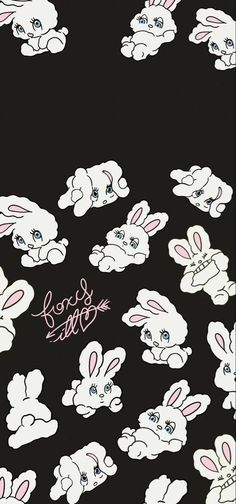 the black background has white rabbits on it