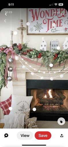 the fireplace is decorated for christmas with garland and lights