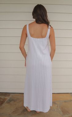 The perfect, casual dress for summer! The Never Better Dress is a lightweight linen blend maxi dress in a shift silhouette. It features a soft square neckline and wide straps - all in a white fabric with pinstripes. Rosalind is 5'8" and is wearing size small size small measurements: 34" bust | 53" length 60% polyester | 40% linen PRODUCTS ON SALE ARE FINAL SALE! Feel free to email us at orders@shopriffraff.com or DM us with any questions regarding fit, styling, or our return policy in general. White Cotton Linen Dress With Square Neck, Casual Maxi Dress With Straight Neckline, Unlined Linen Dress With Straight Neckline For Spring, Striped Linen Dresses For Vacation, Spring Vacation Linen Dress With Square Neck, White Linen Dress With Square Neck For Summer, White Linen Square Neck Dress For Summer, Summer Square Neck Linen Dress For Day Out, White Linen Summer Dress With Square Neck