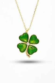 Clover necklace 14K Gold This Leaf 14k Gold Necklace is a beautiful accessory that will bring out the delicate beauty in you. This lovely necklace is crafted with care and precision, designed with a clover-shaped pendant and handcrafted with a delicate 14k gold chain. It has a graceful look that will make heads turn, and bring out your inner radiance. The chain of this exquisite necklace is strong and durable - it won't easily break or snag, so you can wear it for years to come. The small clover Black Clover Necklace, Gold Dainty Necklace, St Patricks Day Gift, St Patrick's Day Gifts, Gold Anniversary, Delicate Beauty, Dainty Gold Necklace, Clover Necklace, 14k Gold Necklace