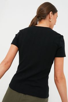 This classic Black Pointelle Bridgette Tee is your closet best friend. An elegant scoop neckline that is made to be form-fitting, pair this with everything from a maxi skirt, to a blazer and denim, to shorts and sneakers. Scoop neckline Short sleeves Fitted top Material: 80% Polyester, 14% Rayon, 6% Spandex Care: Hand wash cold, hang to dry Chic V-neck T-shirt For Night Out, Elegant Fitted T-shirt With Scoop Neck, Fitted Crew Neck Top For Night Out, Chic Fitted Top T-shirt For Night Out, Stretch V-neck T-shirt For Work, Chic Fitted Solid Color T-shirt, Chic Solid Fitted T-shirt, Fitted Black T-shirt For Work, Fitted Black Scoop Neck Top