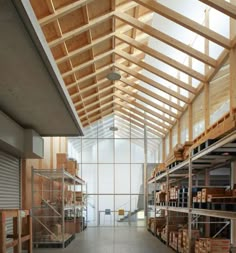 the inside of a warehouse with lots of shelves