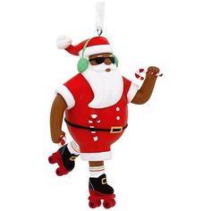 a christmas ornament with a skateboarder wearing sunglasses and a santa hat