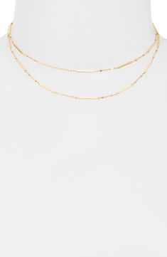 The 18-karat-gold plate brings shimmering light to this double-chain necklace that complements both casual and elevated looks. 14" shortest length; 16" longest length 18k-gold plate Imported Latinx Owned/Founded Gold Double Strand Figaro Chain Necklace, Modern Gold Double Strand Jewelry, Modern Double Strand Gold Jewelry, Modern Double Strand Gold Chain Necklace, Gold Multi-strand Figaro Chain Necklace, Gold Multi-strand Layered Necklace With Figaro Chain, 14k Gold Double Strand Chain Necklace, Minimalist Yellow Gold Double Strand Layered Necklace, Elegant Gold Layered Necklace With Figaro Chain