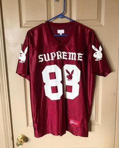 Curated Streetwear 🃏 on Instagram: “Supreme x Playboy Football Jersey🍒 Size: L/ Cond: 8/10 SOLD* #supreme #playboy #supremeplayboy #supremexplayboy #supremenewyork…” Supreme Football Jersey, Gothic Shirts, Character Board, Lifestyle Fashion, Football Jersey, Inspirational Tattoos, Football Jerseys, Fashion Lifestyle