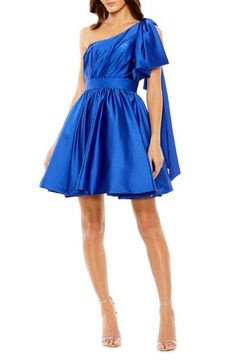 A blazing blue dress keeps it festive with a bow-topped shoulder, flouncy skirt, and a glossy satin fabrication. 34 1/2" length Hidden back-zip closure One-shoulder neck Lined 100% polyester Spot clean Imported Asian & Pacific Islander Owned/Founded Evening Blue Dress With Bow Detail, Elegant Blue Mini Dress With Bow, Blue Bow Mini Dress For Party, Evening A-line Mini Dress With Satin Bow, Royal Blue One-shoulder Evening Dress, Blue Satin Finish Party Dress, Blue Satin Finish Evening Dress, Flouncy Skirt, Pacific Islander