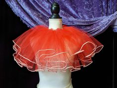 "This large tulle ruffle neck collar is Nice and puffy! perfect for any Victorian , queen or Clown costume, Plus many more! Handmade from two layers of soft bridal tulle in red tulle, then trimmed with white yarn on all layers. This neck collar is easy to wear just tie it on! Neck measurements is best when ordering. If not then collar will be made in a one size fits most. tulle measures 12\" wide Please allow up to a week to make before shipping. **Please read all info before buying** ---------- Halloween Costume Petticoat With Ruffles, Clown Collar, Victorian Queen, Bib Collar, Clown Costume, Collar Neck, White Tulle, Moon Design, Costume Halloween