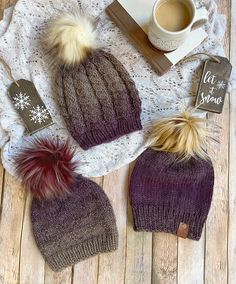 How adorable is this purple ombré with the fluffy pompoms?!? I have fallen in love with each of these adorable beanie designs and you will too!! They are so soft and warm and have the perfect amount of stretch to fit any head!  This listing is for your choice of three different taupe and eggplant purple ombré beanies with removable faux fur pompoms. You will receive the exact hat(s) that is pictured.  Simply select your beanie from the drop down menu and click add to cart. Proceed to checkout an Purple Winter Beanie One Size, Purple Winter Hat For Cold Weather, Winter Purple Beanie, Winter Purple Knitted Hat, Purple Hand Knitted Beanie For Winter, Hand Knitted Purple Beanie For Winter, Warm Purple Beanie For Winter, Warm Purple Winter Beanie, Purple Yarn Beanie For Winter