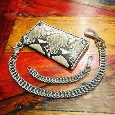 Half Persian chainmaille weave wallet chain. Can be made from stainless steel, black stainless steel, brass, copper, various anodized aluminum or a combination of the two. Wallet Chains, Cedar Rapids, Coin Ring, Anodized Aluminum, Wallet Chain, Black Stainless Steel, Purse Wallet, Persian, Wallets